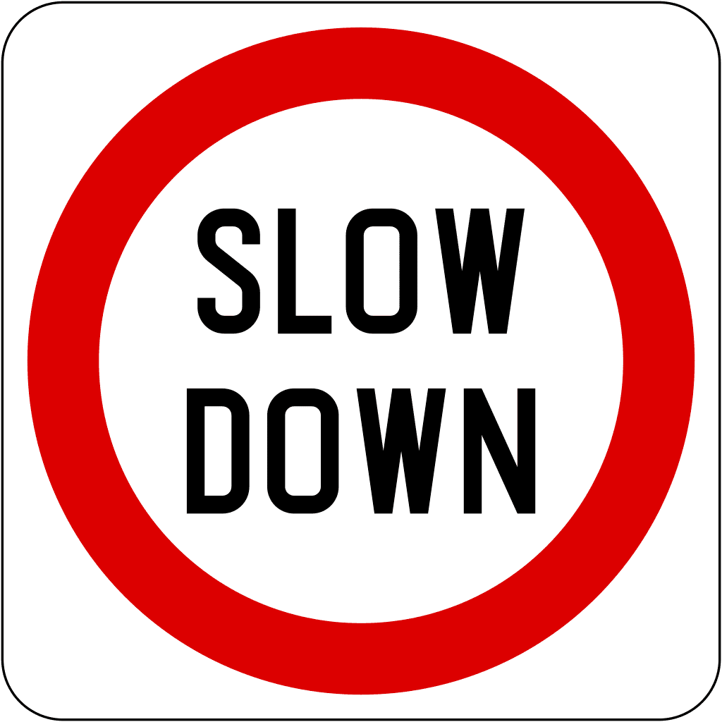 Slow down road sign